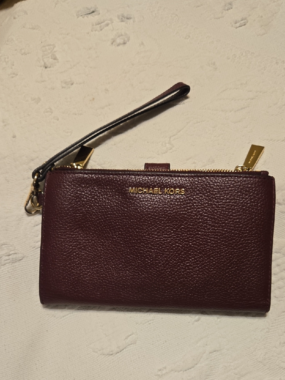 Michael Kors Burgundy Pebbled Leather Wristlet with Gold Hardware